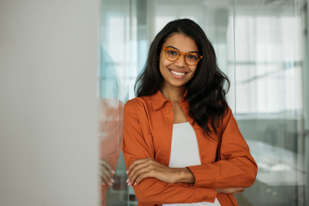 Portrait of smiling African American business woman wearing sty