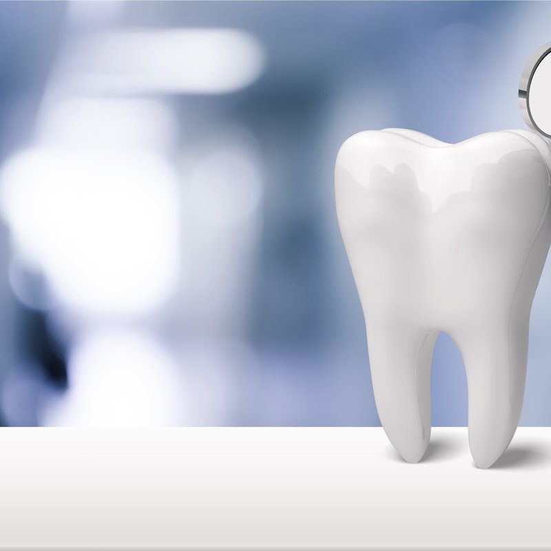 Tooth and dentist mirror